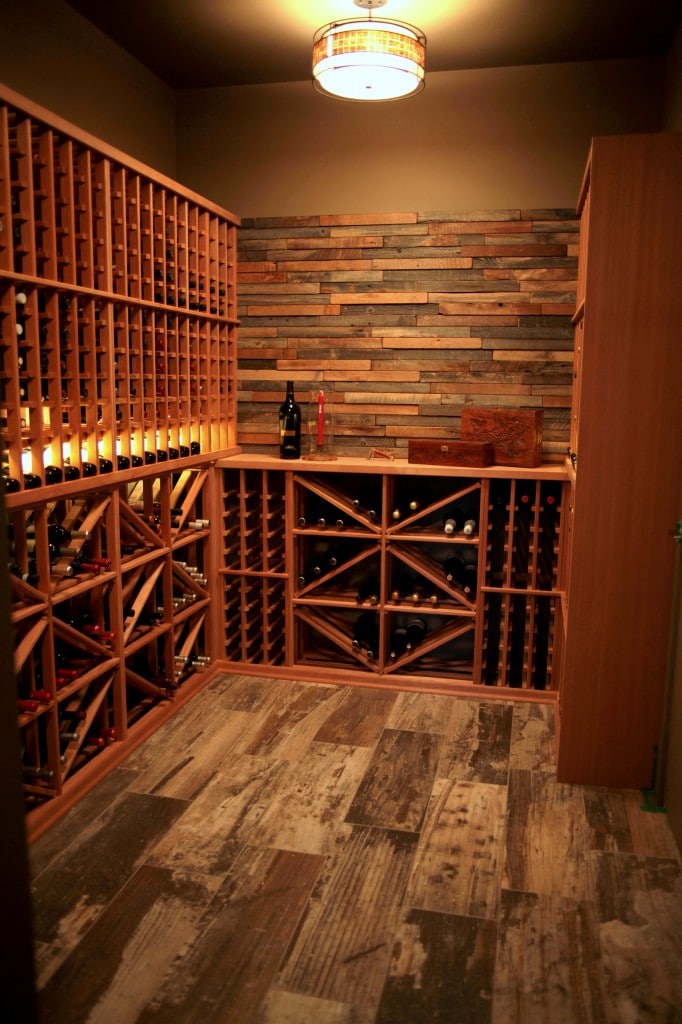 Redwood Wine Cellar with Reclaimed Wood Flooring and Backsplash