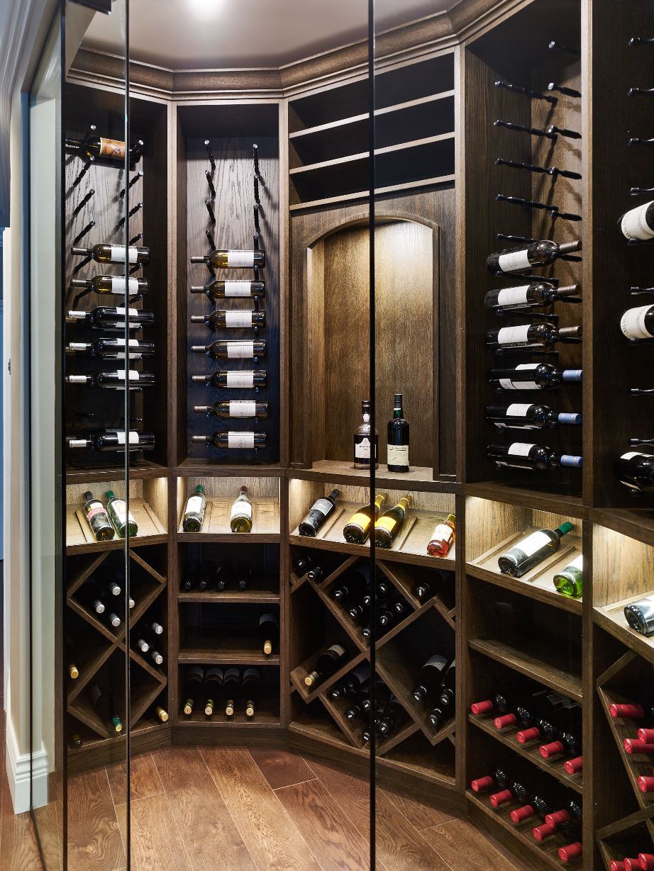 Seamless Glass Wine Cellar Door Stained Oak Millwork and Contemporary Wine Cellar Racks